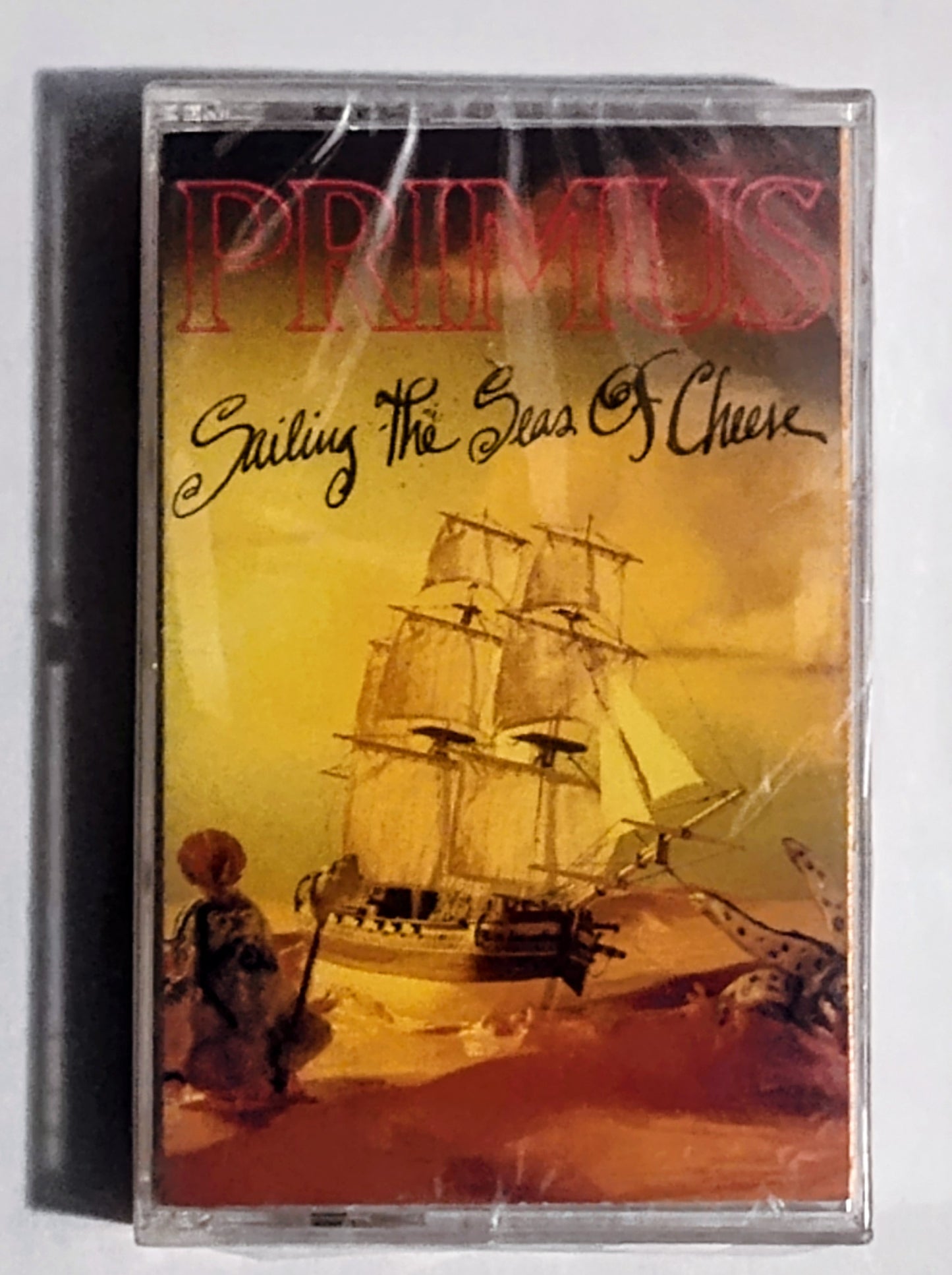 Primus - “Sailing The Seas Of Cheese” - CASSETTE TAPE NM/M (Sealed; Cellophane has 2-3 clean tears/holes but seal is intact!)