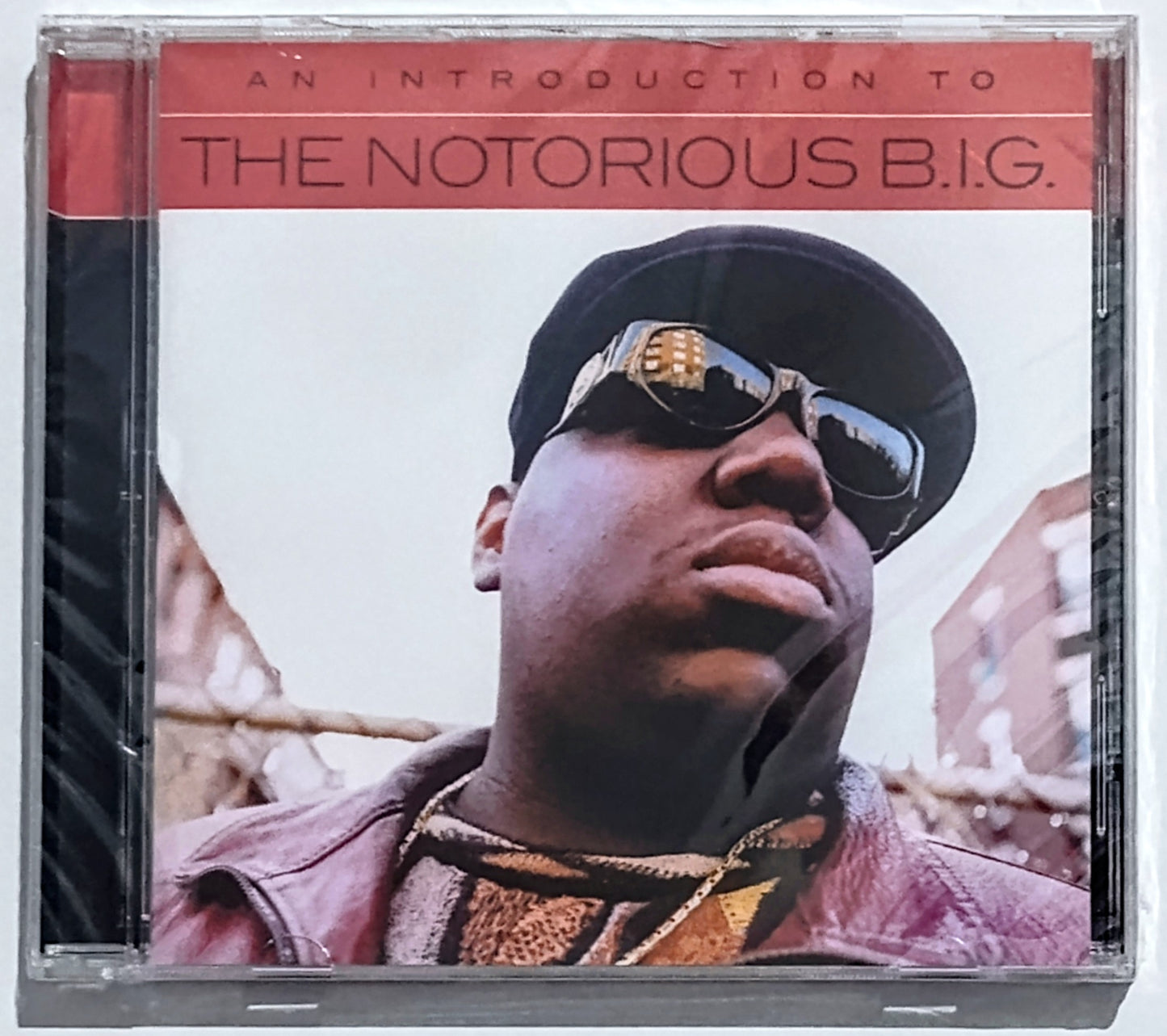 Notorious B.I.G. - “An Introduction To The Notorious B.I.G. (Compilation)” - COMPACT DISC VG+/M (Sealed; cracked case)