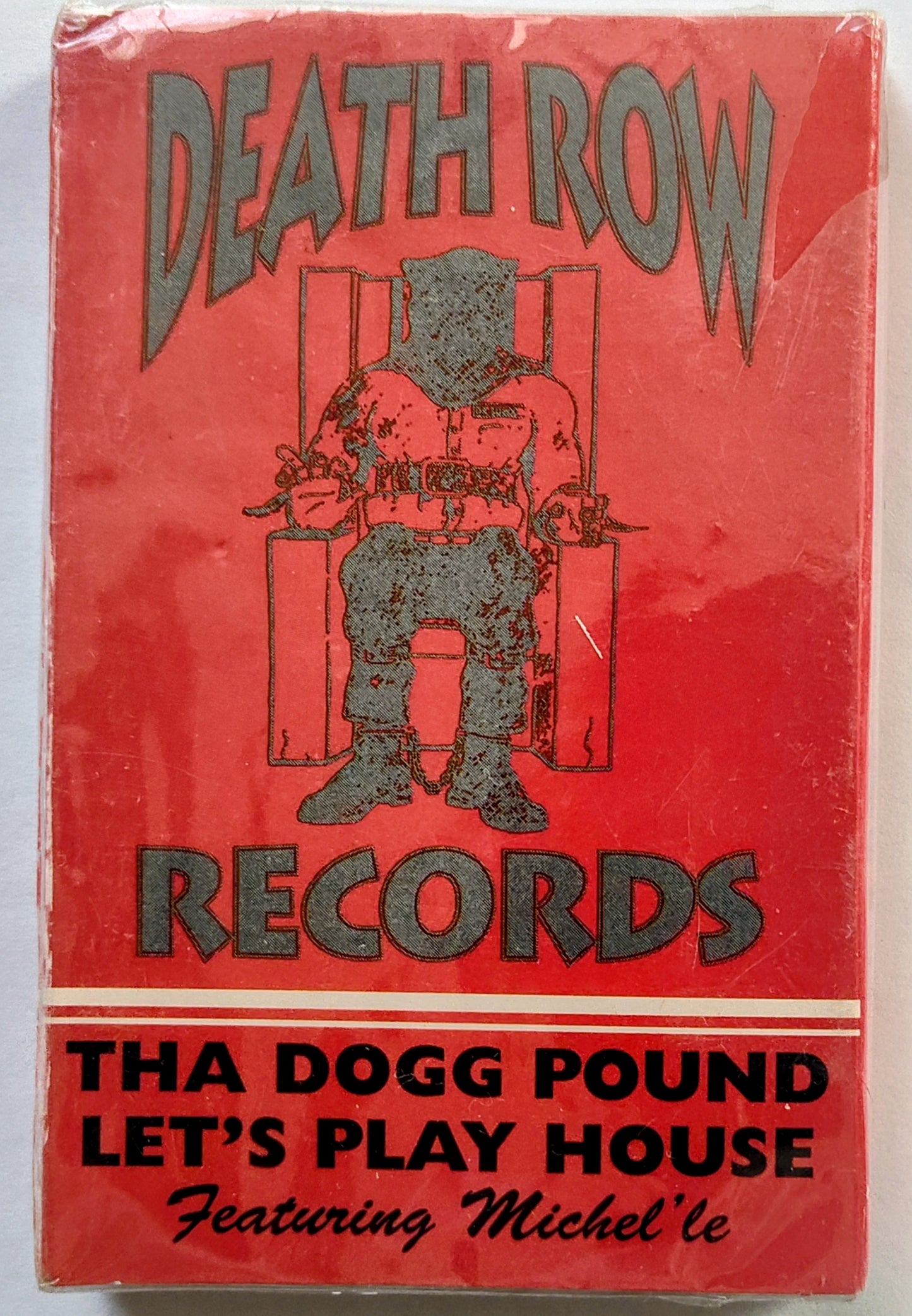 Tha Dogg Pound - “Let’s Play House (Featuring Michel’le)” - CASSETTE TAPE (Single) VG+/M (Sealed; small tear in cellophane; shelf wear)