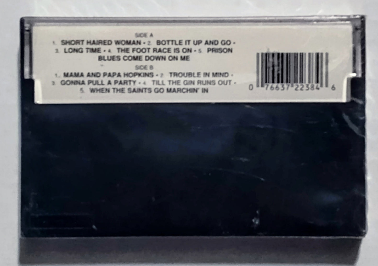 Lightnin’ Hopkins - “Lightnin’ Strikes” - CASSETTE TAPE M/M (Sealed)