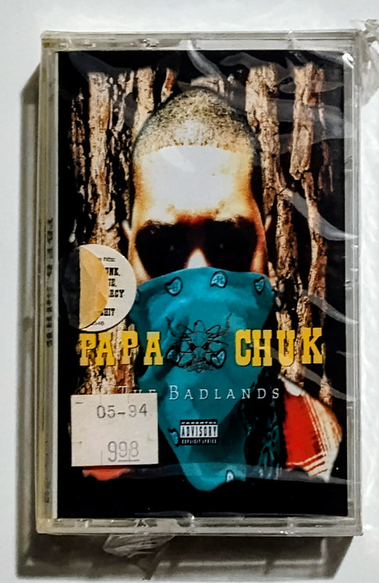 Papa Chuk - "The Badlands" - CASSETTE TAPE VG+/M (Sealed; cracked case; tear in seal)