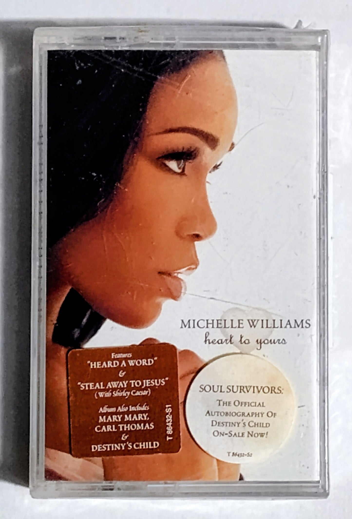 Michelle Williams (Destiny's Child) - “Heart To Yours” - CASSETTE TAPE VG+/M (Sealed with hype sticker; large crack across cover; tiny tears in cellophane; security device attached; original price tag attached)