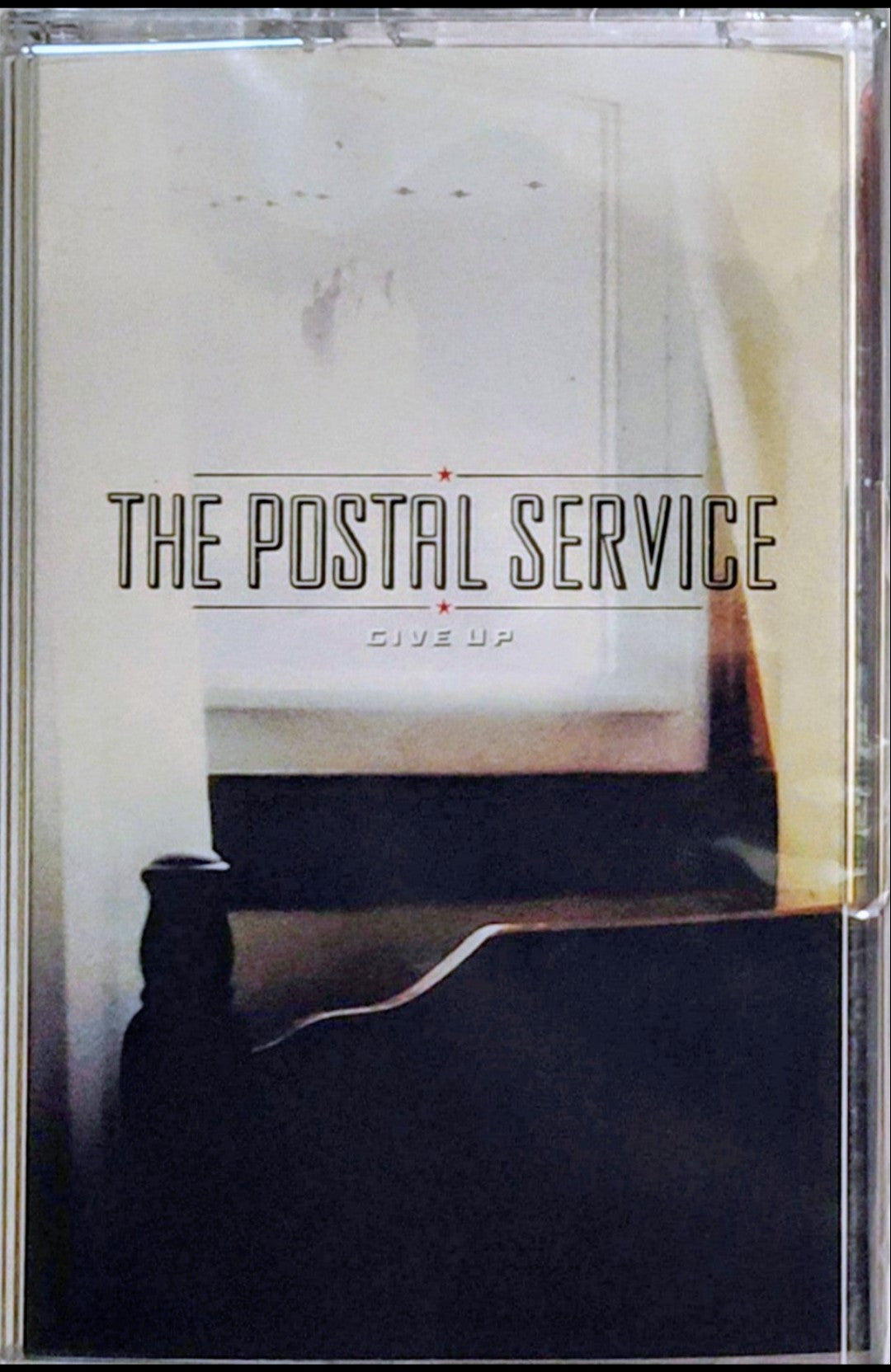 Postal Service, The - "Give Up" - INDIE CASSETTE TAPE (Translucent red shell) M/M (Sealed) *🔥*