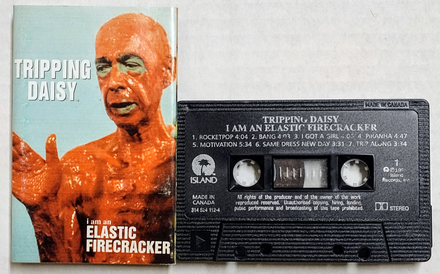 Tripping Daisy - "I Am An Elastic Firecracker" - CASSETTE TAPE (Canada; black shell) VG/VG