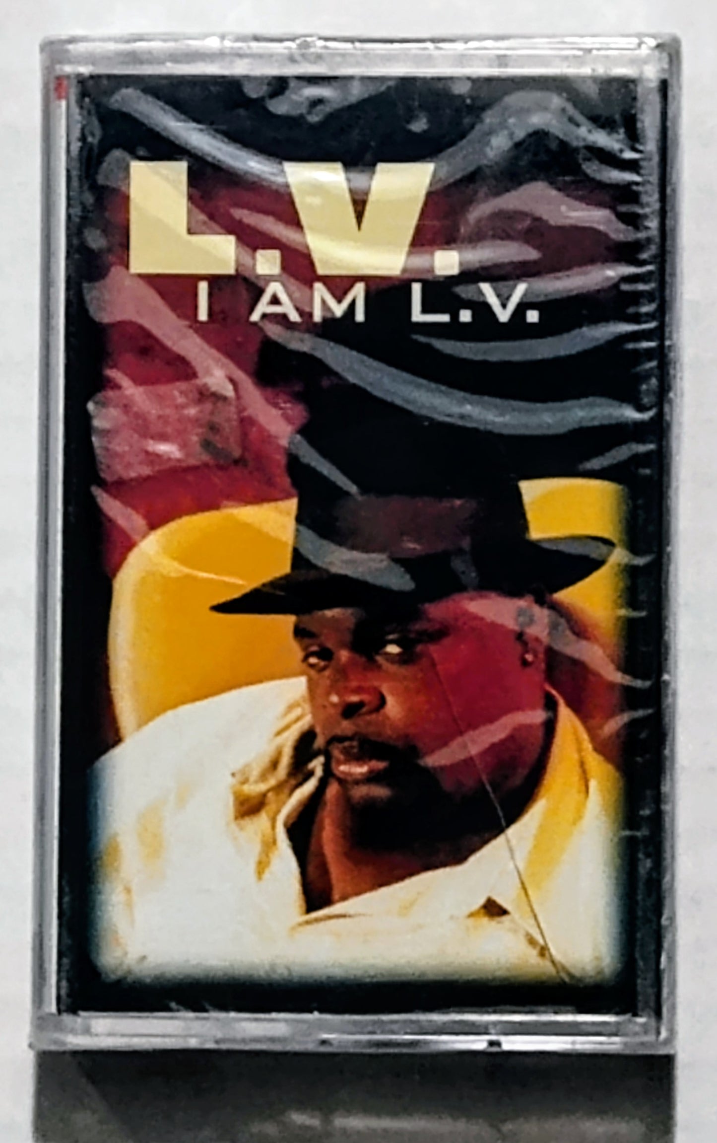 L.V. - "I Am L.V." - CASSETTE TAPE NM/M (Cracks in cover and spine of case)