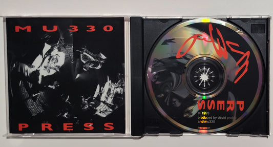 MU330 - "Press" - COMPACT DISC NM/NM