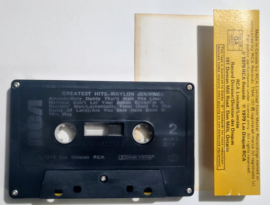 Waylon Jennings - "Greatest Hits" - CASSETTE TAPE (Canada; black shell) VG+/VG+