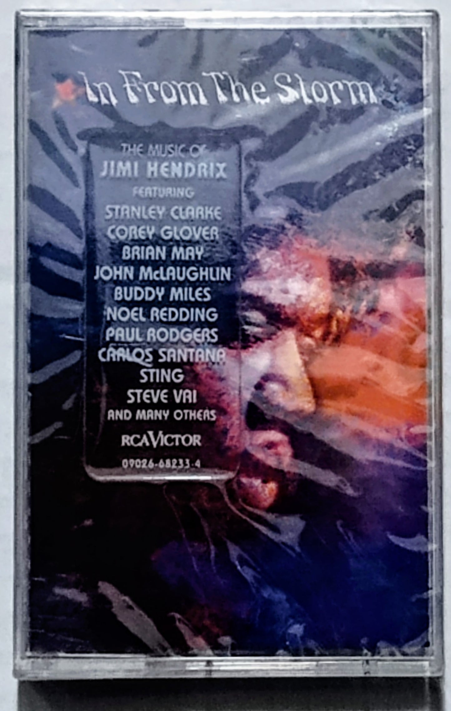 Various Artists - “In From The Storm: The Music Of Jimi Hendrix (Tribute)” - CASSETTE TAPE NM/M (Sealed; tiny crack/tear in cellophane)