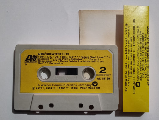 Abba - "Greatest Hits" - CASSETTE TAPE (Canada; black shell; DOLBY) VG/G+ (Cosmetic downgrade only)
