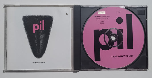 Public Image Ltd. (PIL) - "That What Is Not (Pink Disc Version)" - COMPACT DISC VG/VG (Hole punch)