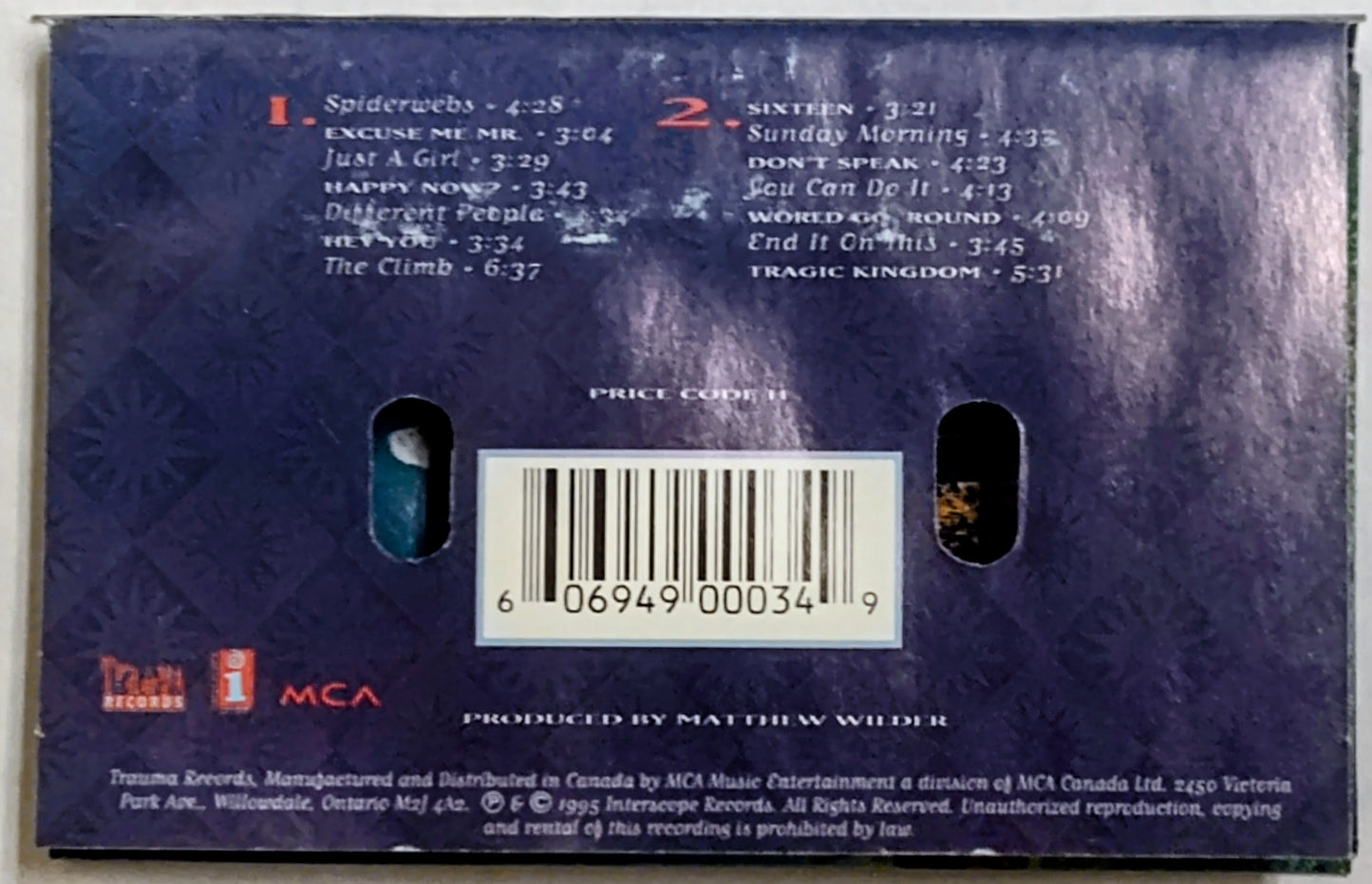 No Doubt - “Tragic Kingdom” - CASSETTE TAPE (Canada; clear shell) G+/VG (Water damaged j card) *🌟*