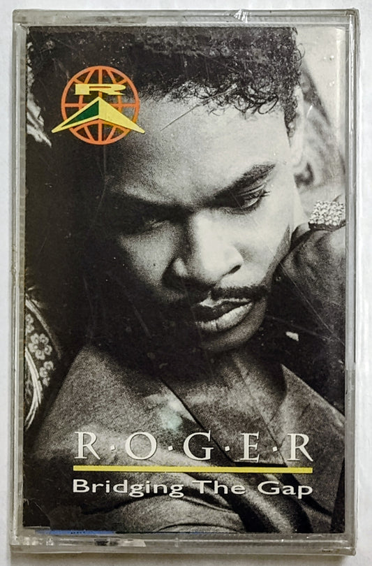 Roger - “Bridging The Gap” - CASSETTE TAPE NM/M (Sealed; cracks on front and back of case)