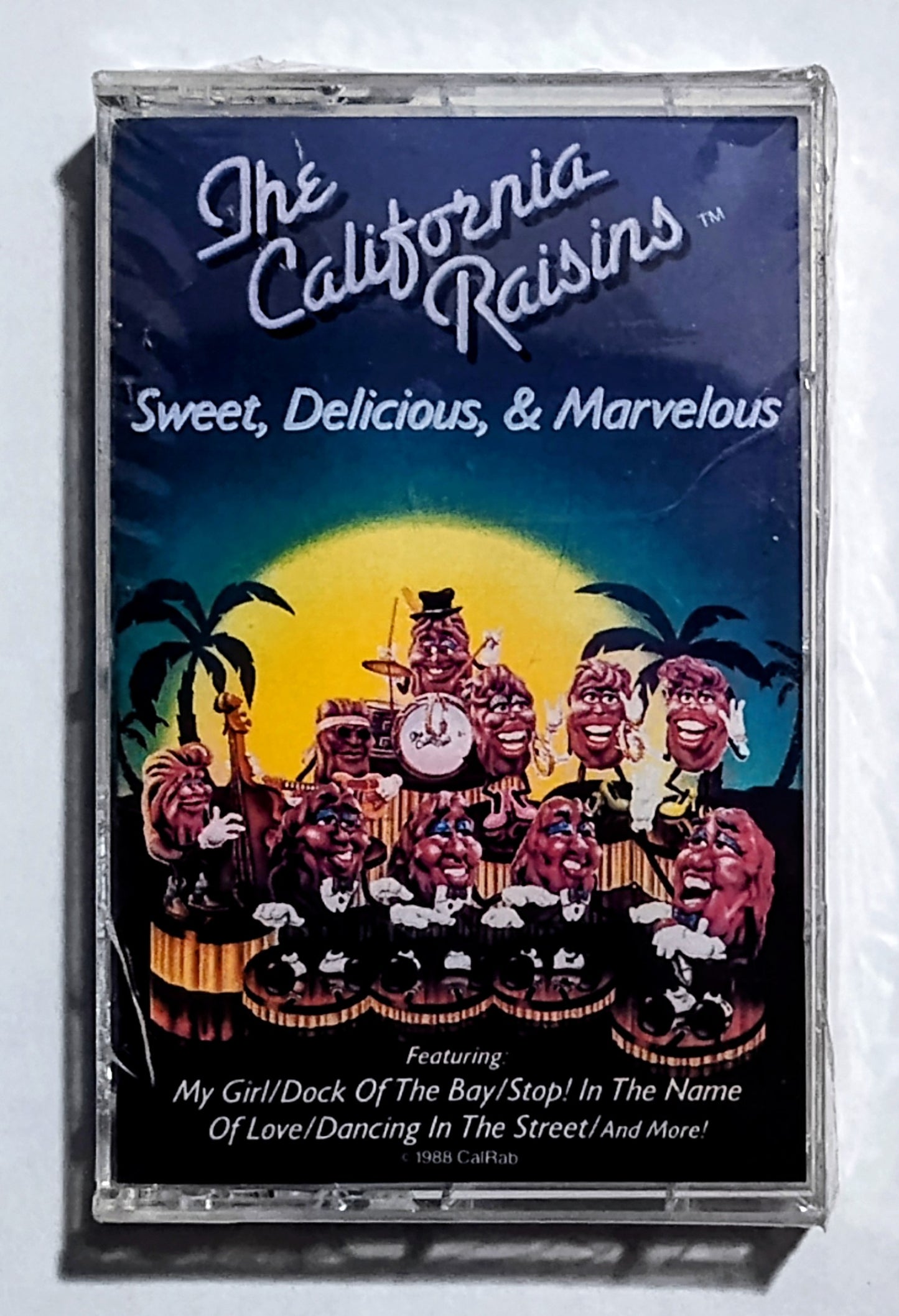 California Raisins, The - “Sweet, Delicious, & Marvelous” - CASSETTE TAPE NM/M (Sealed; crack in cover of case)