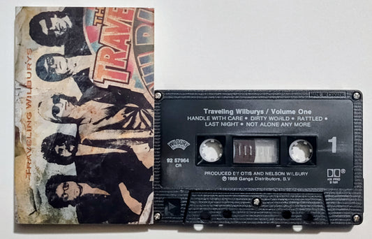Traveling Wilburys - "Volume One" - CASSETTE TAPE (Canada; Black shell; DOLBY HX PRO B NR) VG+/VG+
