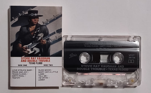 Stevie Ray Vaughan And Double Trouble - "Texas Flood" - CASSETTE TAPE (Canada; clear shell) VG+/VG+