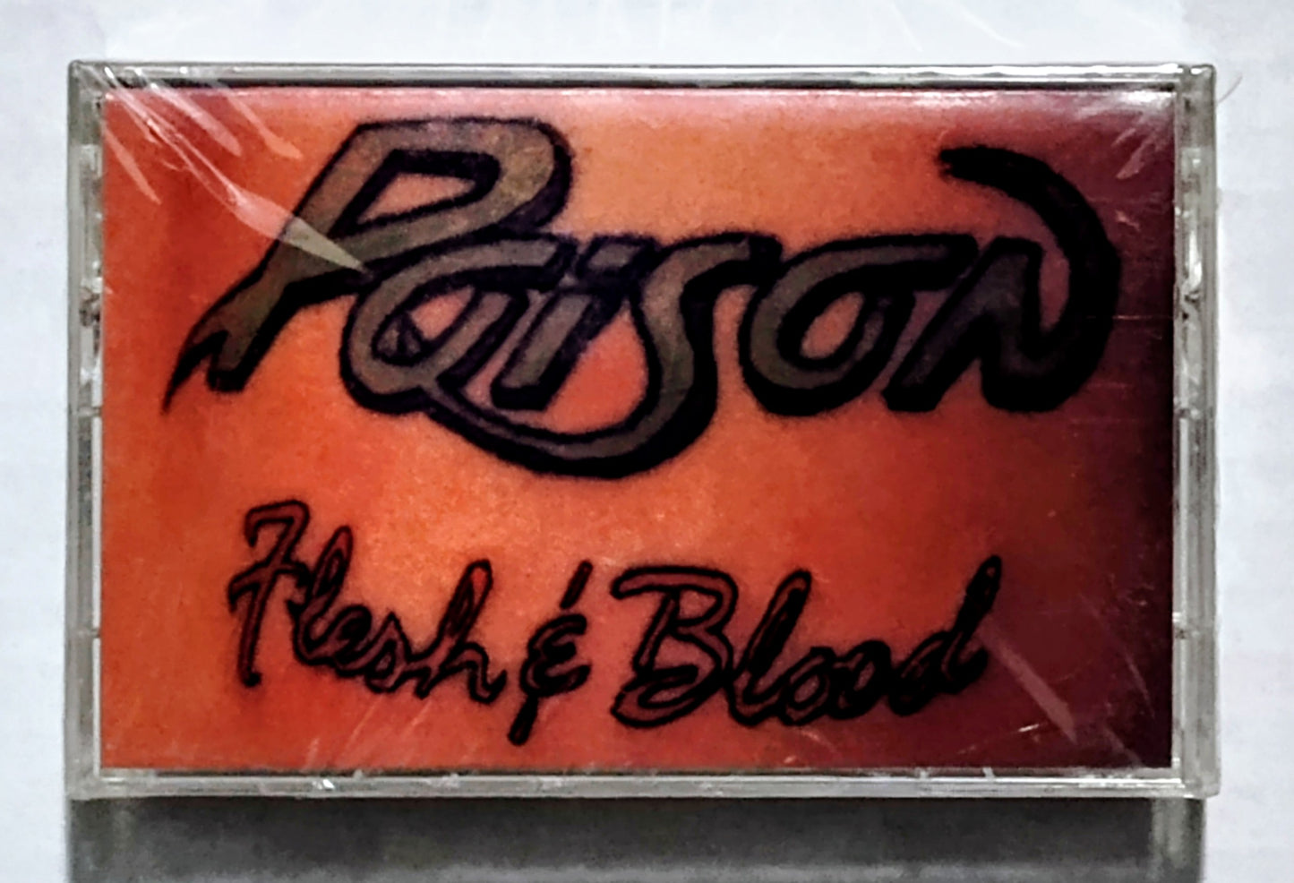 Poison - “Flesh & Blood” - CASSETTE TAPE NM/M (Sealed; large crack in cover; small crack in upper right corner; cellophane slightly ripped in upper left corner)