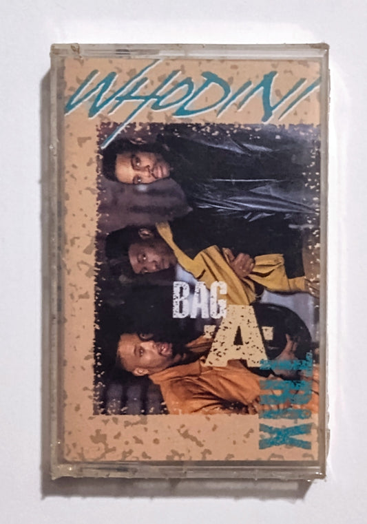 Whodini - "Bag-A-Trix" - CASSETTE TAPE (DOLBY HX PRO B NR) NM/M (Sealed; hole in barcode)