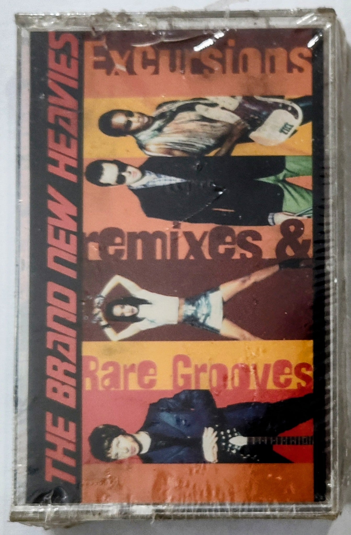Brand New Heavies, The - “Excursions: Remixes & Rare Grooves” - CASSETTE TAPE NM/M (Sealed; torn cellophane)