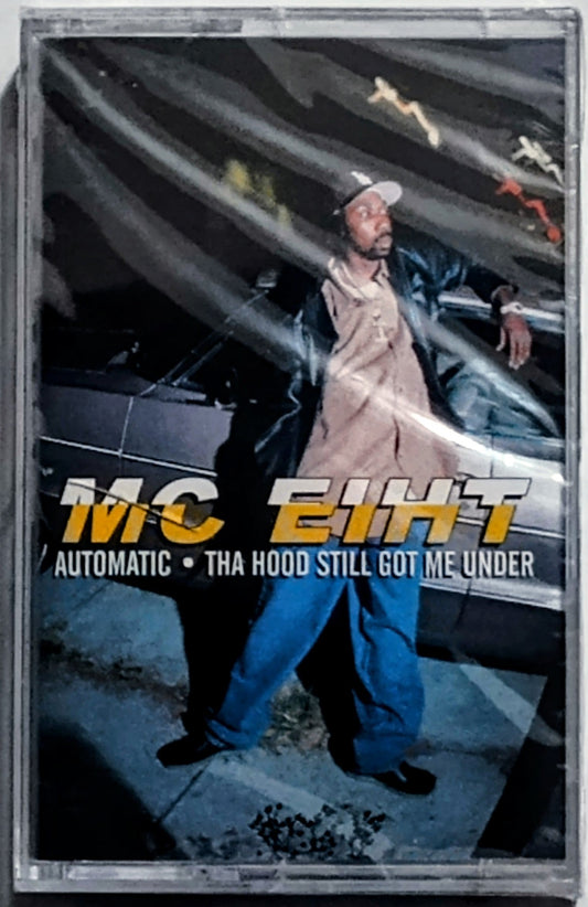 M.C. Eiht - “Automatic/ Tha Hood Still Got Me Under” - CASSETTE TAPE (Maxi Single) NM/M (Sealed; small crack in cover)