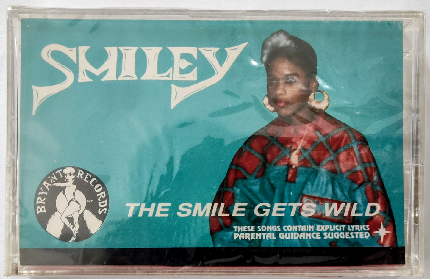 Smiley - “The Smile Gets Wild” - CASSETTE TAPE NM/M (Sealed; cracked back of case)