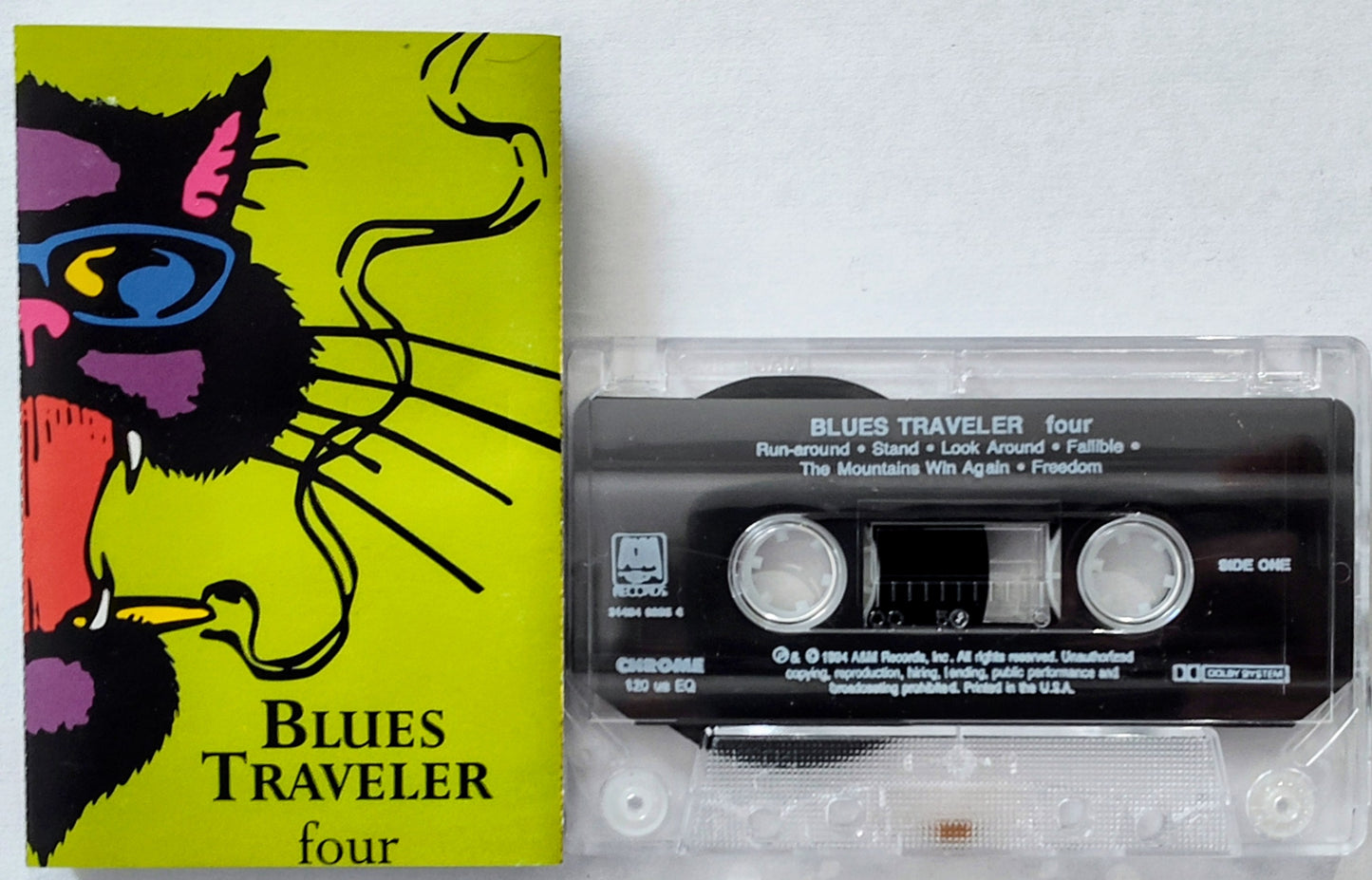 Blues Traveler - “Four” - CASSETTE TAPE VG+/VG (Cacked shell; does not affect play) *🚨*