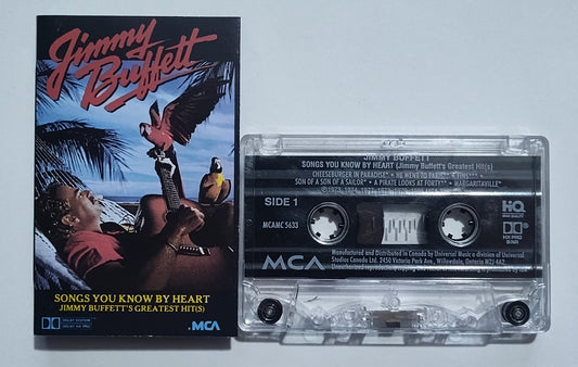 Jimmy Buffett - "Songs You Know By Heart" - CASSETTE TAPE (Canada; clear shell; DOLBY HX PRO B NR) VG/VG