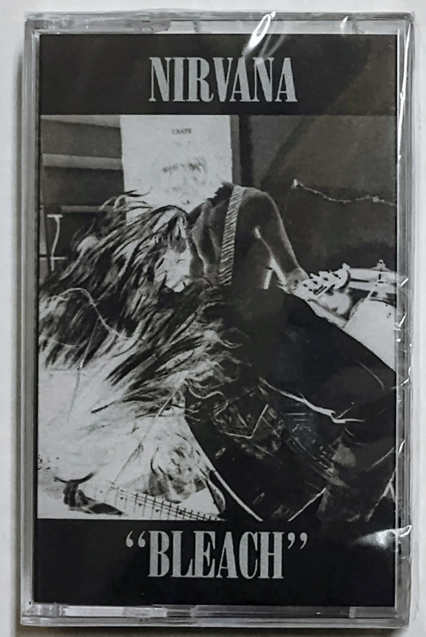 Nirvana - "Bleach" - CASSETTE TAPE (Reissue; Black shell) NM/M (Sealed; Discounted due to crack in cover of case)